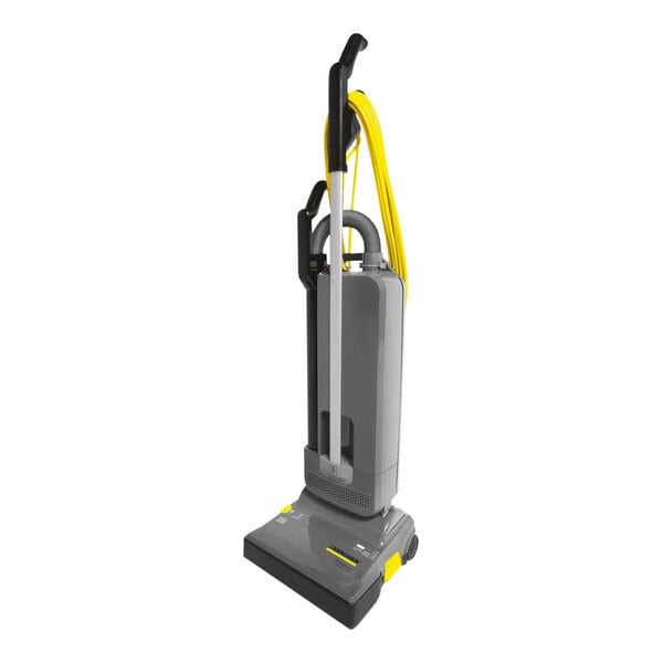 A white and grey Karcher CVU 30/1 HEPA bagged upright vacuum cleaner with yellow accents.