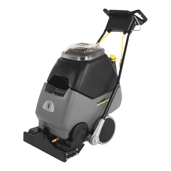 A Karcher walk behind carpet extractor with a handle.