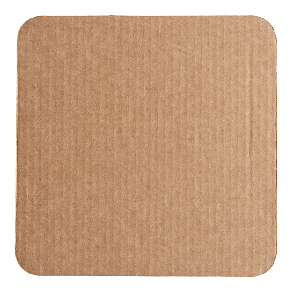 A close up of a brown square Southern Champion cake pad with a Mardi Gras design.