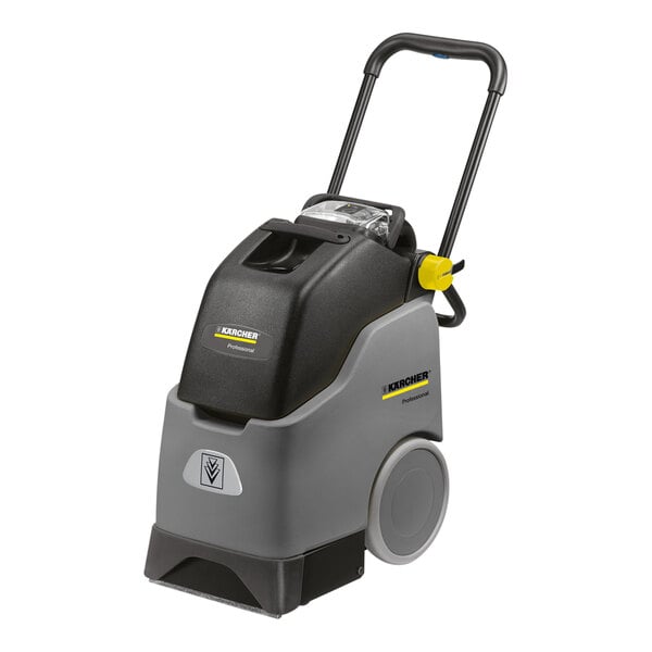 A black and grey Karcher BRC 30/15 C walk behind carpet extractor with wheels and a handle.