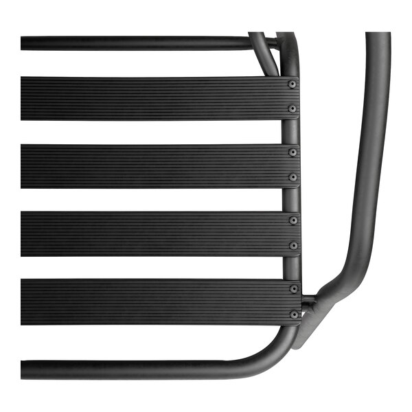 A close-up of a Lancaster Table & Seating black powder-coated steel outdoor arm chair.