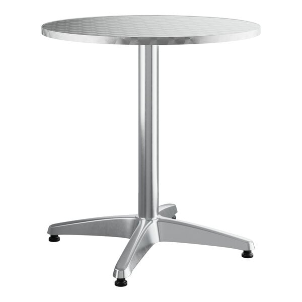 A Lancaster Table & Seating round table with a metal base.