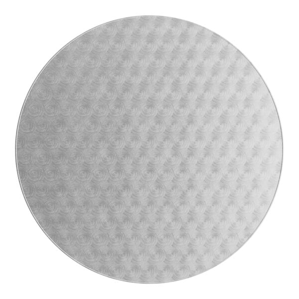 A white circular table with a grey surface pattern.
