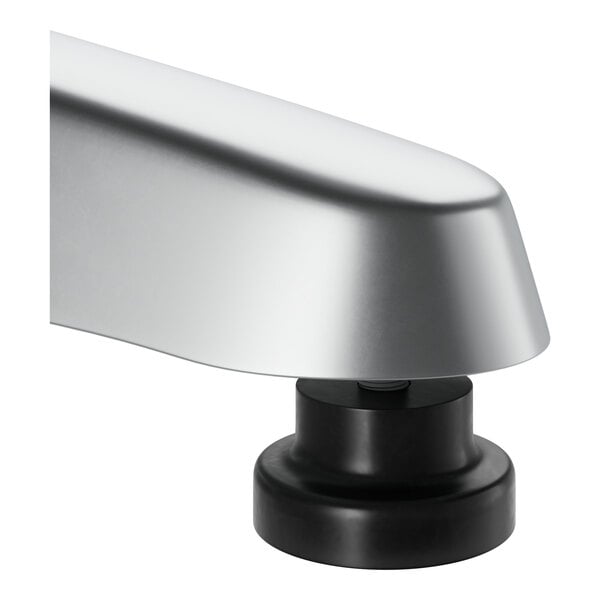 A close-up of a Lancaster Table & Seating chrome round table base with a round black base.