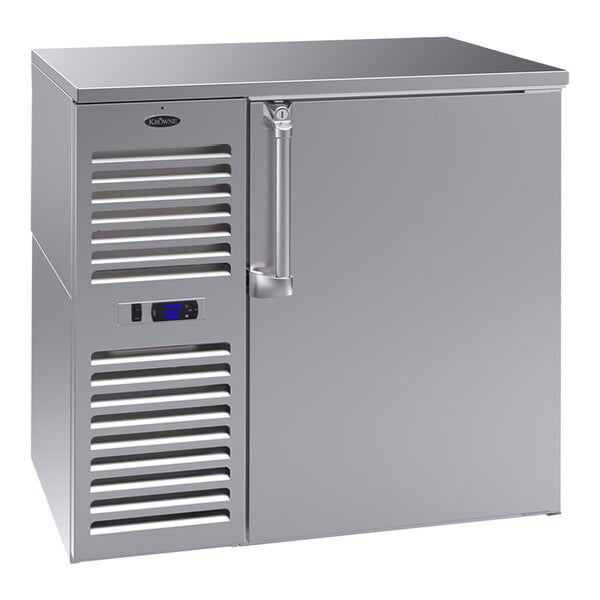 A Krowne stainless steel back bar refrigerator with a door open.