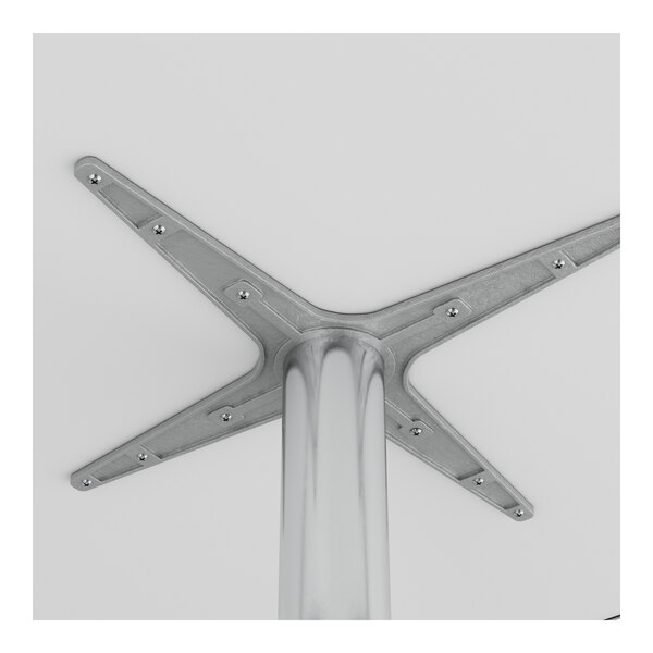 A close up of a Lancaster Table & Seating chrome square metal table top with a metal base.