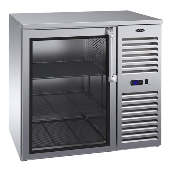 A Krowne stainless steel back bar refrigerator with glass doors.