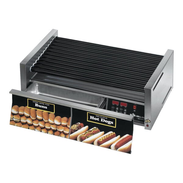 A Star Grill-Max hot dog roller with hot dogs on it.