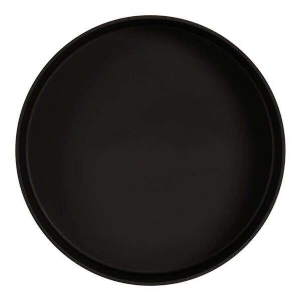 A black round melamine bowl with a white background.
