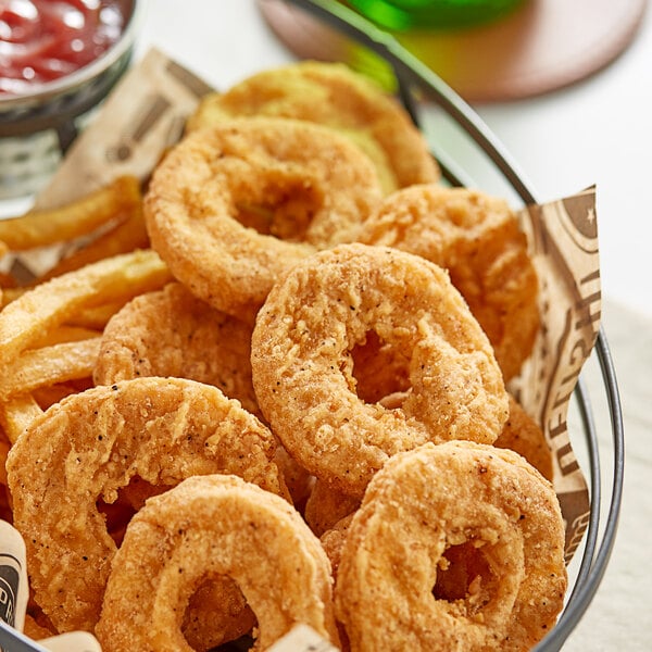 A bowl of Brakebush Gold'N'Spice Chik'N O's with ketchup.