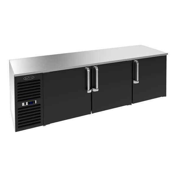 A black Krowne back bar refrigerator with two solid doors.