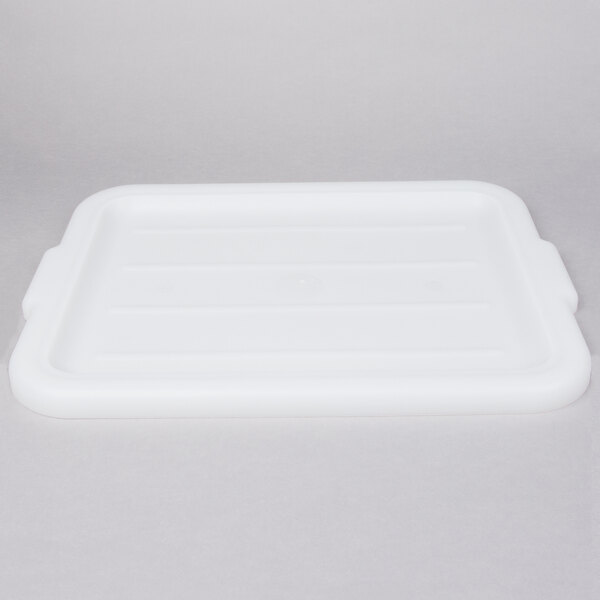 A white Vollrath Traex plastic lid for a food storage box.