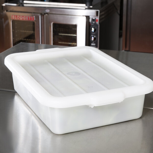 A white Vollrath Traex food storage box lid on a counter.