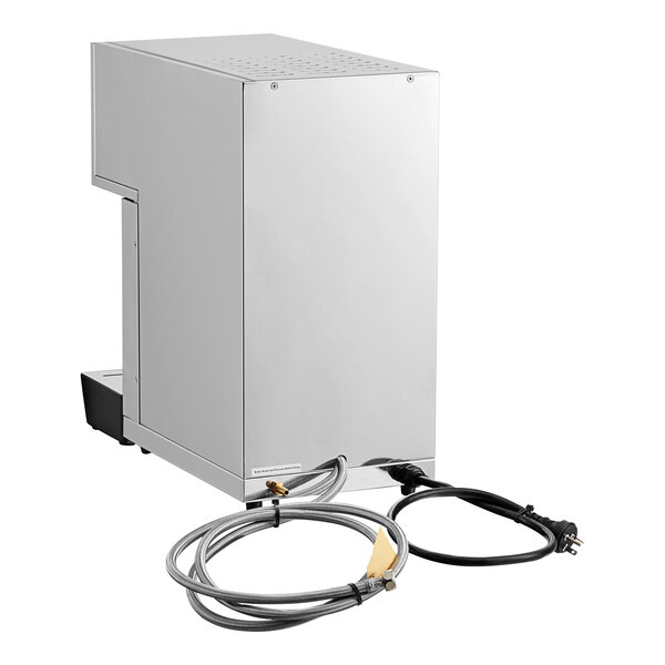 An automatic digital milk steamer and hot water dispenser with a stainless steel exterior and attached power and water hoses.
