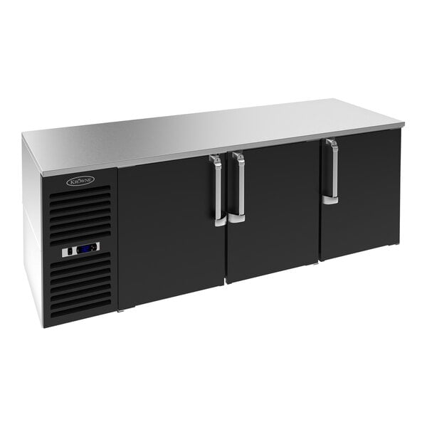 A black Krowne back bar refrigerator with two narrow doors.