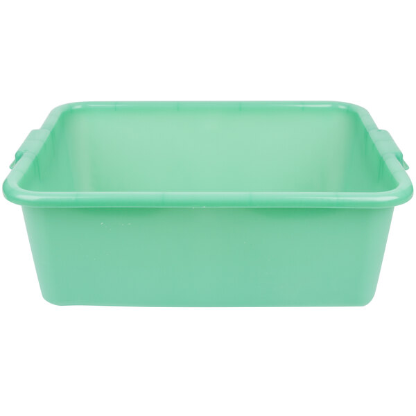 A green plastic Vollrath Traex drain box.