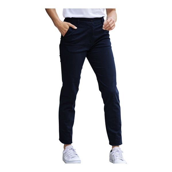 A woman wearing dark navy Edwards performance pants.