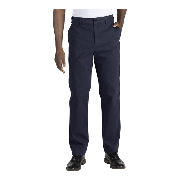 A man wearing Edwards dark navy blue workwear pants.