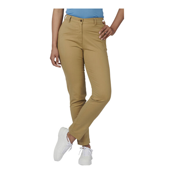 The lower half of a woman wearing Edwards 4-way stretch tan pants.