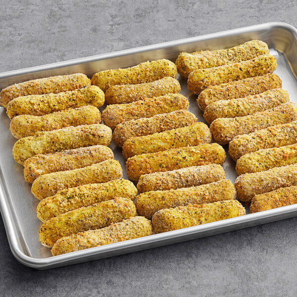 A tray of Imposter Dairy-Free Vegan Mozz Sticks on a table.