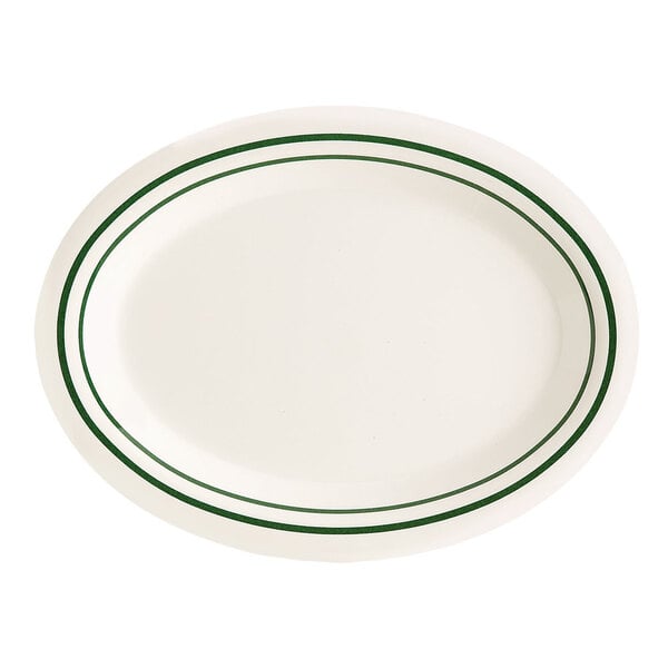 A white oval platter with green lines.