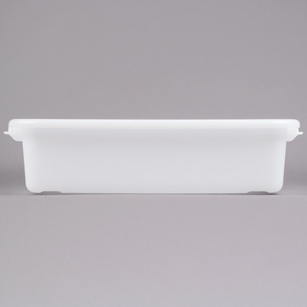 A white plastic Vollrath Traex drain box.