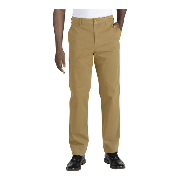 A man wearing Edwards tan performance stretch pants.