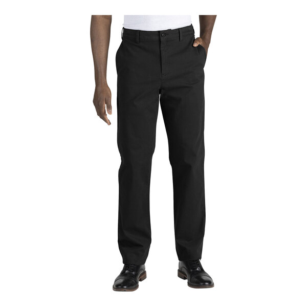 A man wearing Edwards black workwear pants.