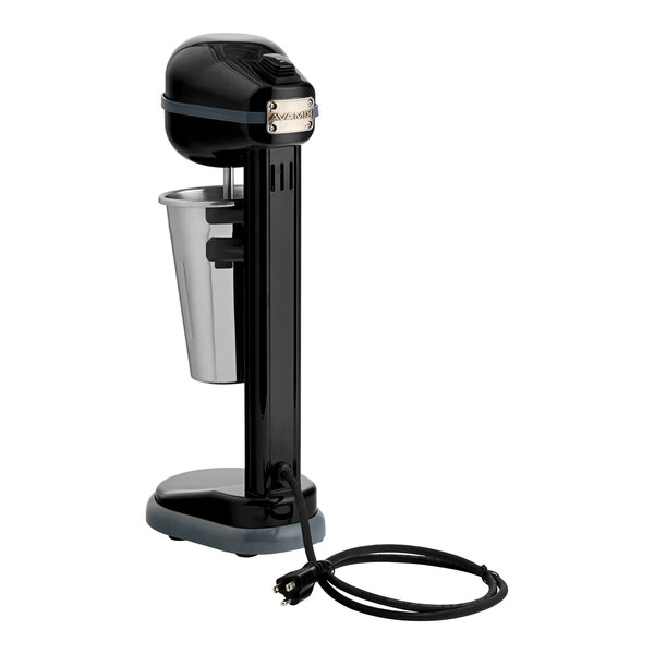 A close-up of a black and silver AvaMix drink mixer with a cord attached.