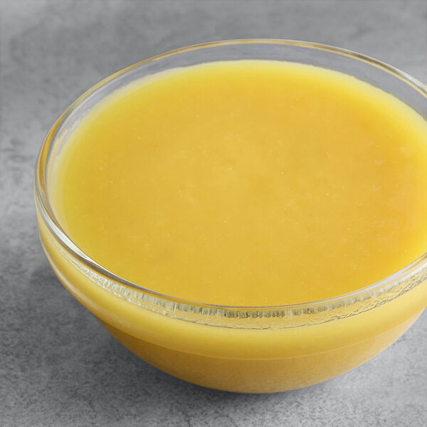 A bowl of Les Vergers Boiron Pineapple fruit puree.