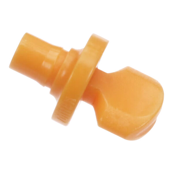 A close up of a yellow Zumex retaining knob with a small hole.