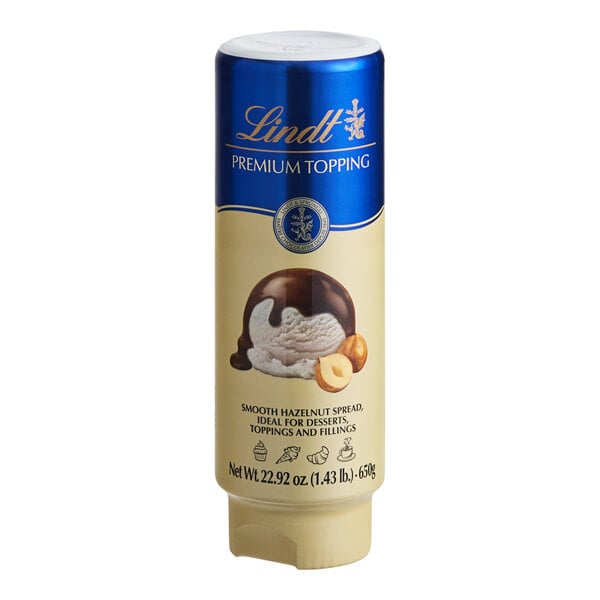 A container of Lindt Hazelnut Chocolate Spread with a white label.