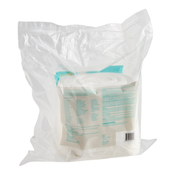 A clear plastic bag containing a large roll of white wipes with blue text on the packaging.