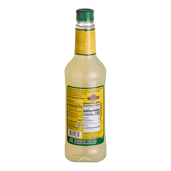A bottle of Texas Roadhouse Margarita Mix with a yellow label.