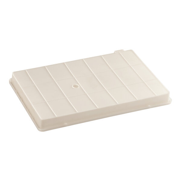 A white plastic lower evaporator pan with holes.