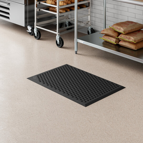 Lavex 2' x 3' Heavy-Duty Black Rubber Anti-Fatigue Diamond Floor Mat with Beveled Edge - 1/2" Thick