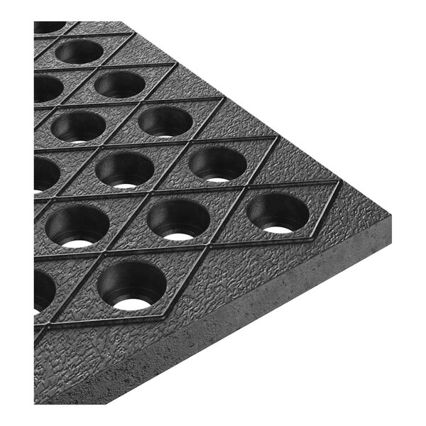 A heavy-duty black rubber anti-fatigue floor mat with diamond pattern and circular holes.