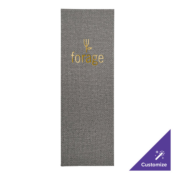 A grey fabric menu cover with gold text that reads "Milan" on it.