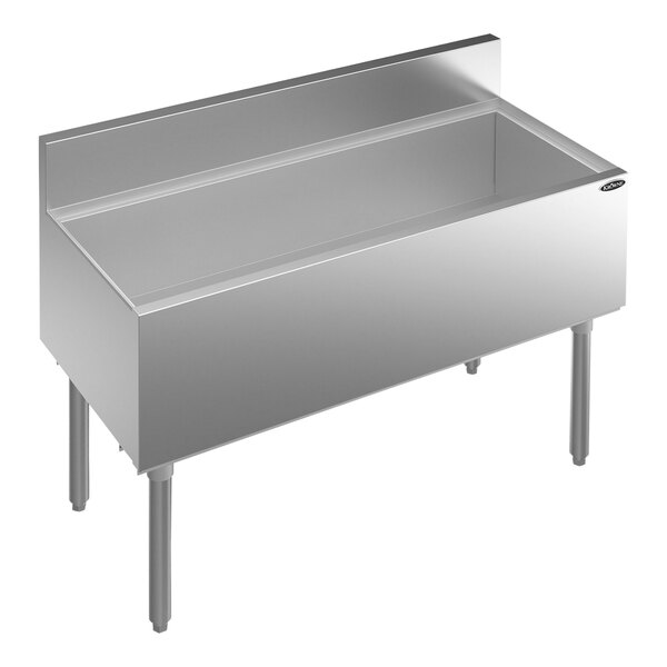 A Krowne Royal Series stainless steel underbar ice bin on a counter.