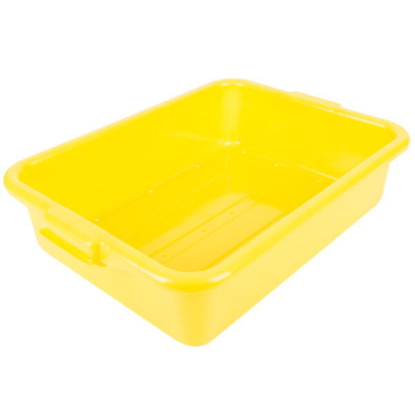 A yellow plastic Vollrath Traex drain box.