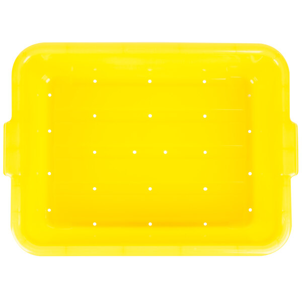 A yellow plastic tray with holes.
