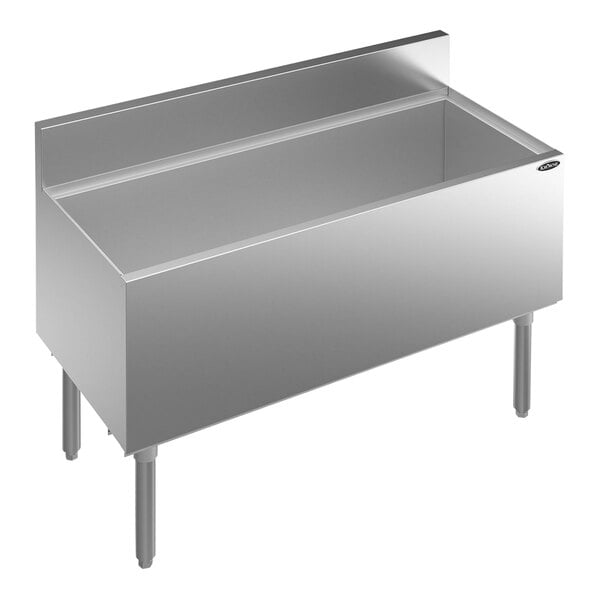 A Krowne Royal Series stainless steel underbar ice bin with a drain.