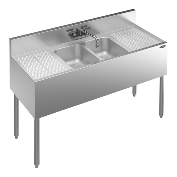 A Krowne Royal Series stainless steel underbar sink with two bowls, a faucet, and two drainboards.