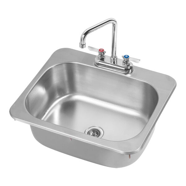 A Krowne stainless steel drop-in sink with a faucet.