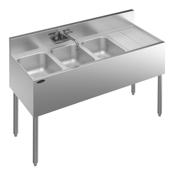 A Krowne Royal Series stainless steel underbar sink with three bowls and a faucet on the right.