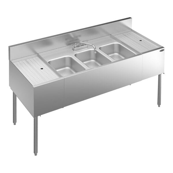 A stainless steel Krowne underbar sink with 3 bowls, 2 drainboards, and a faucet.