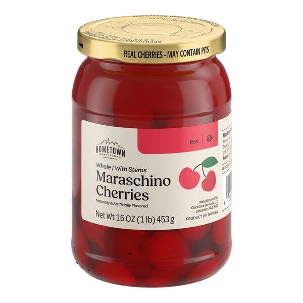 A 16-ounce glass jar of maraschino cherries with stems.