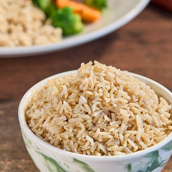 A bowl of Lotus Foods brown basmati rice with vegetables.