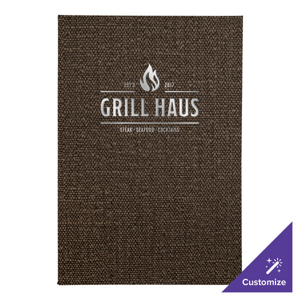 A brown menu cover with the words "Grill Haus" on it.