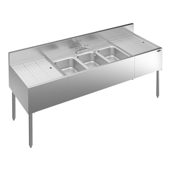 A Krowne stainless steel underbar sink with 3 bowls, 2 drainboards, and a faucet.